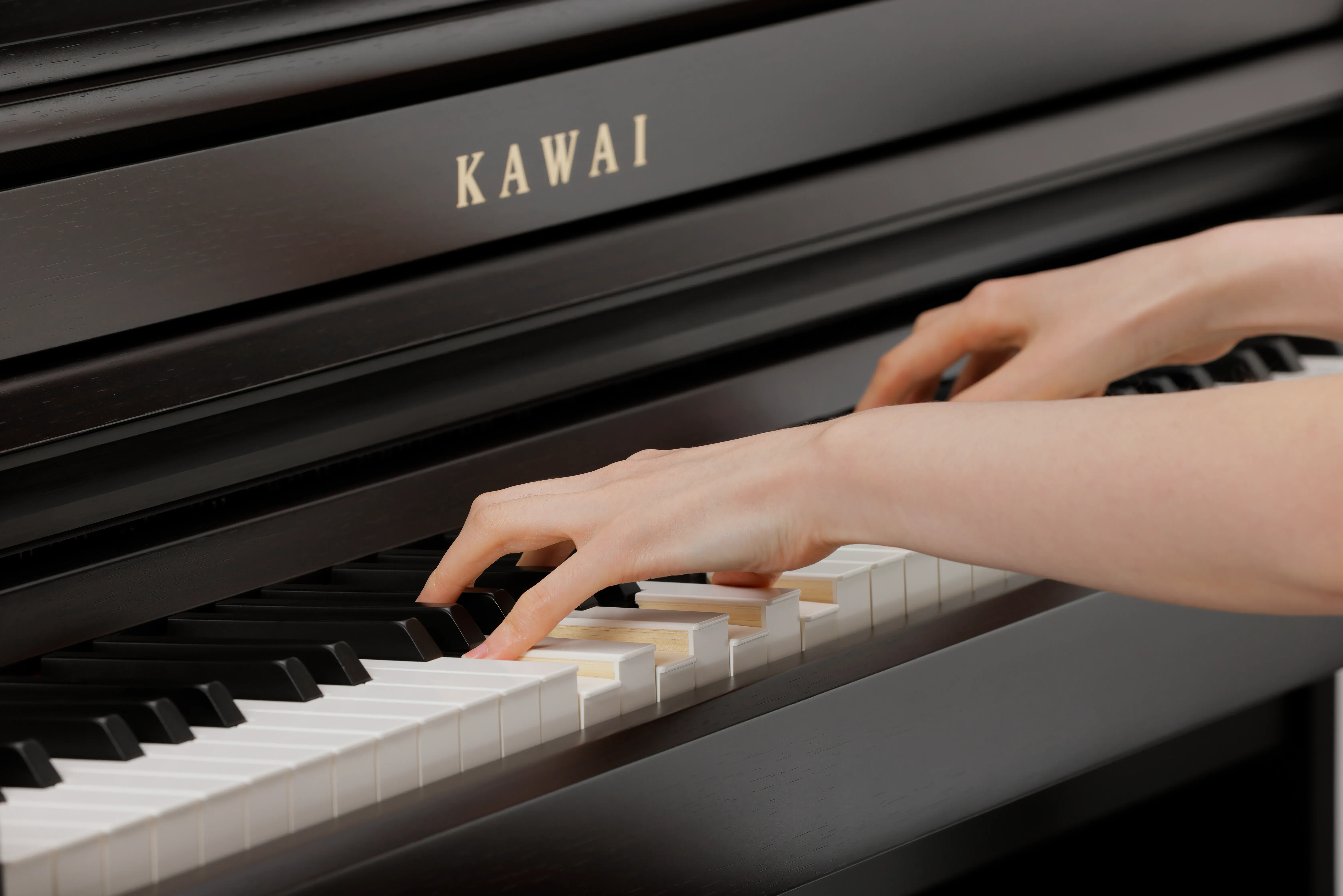 Hands playing the Kawai CA401