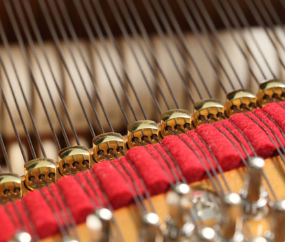 Concert agraffes and strings inside a Shigeru Kawai piano