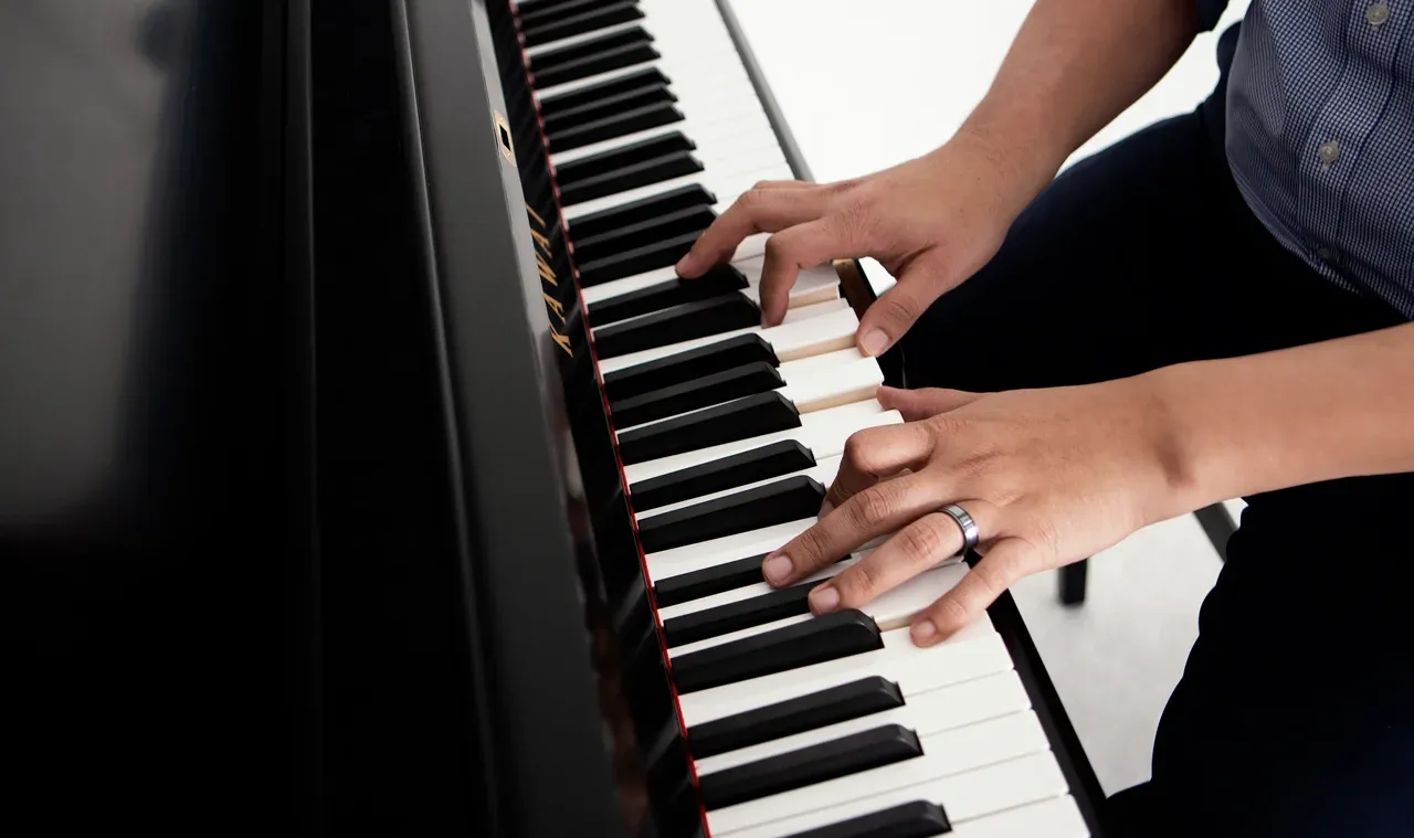 Hands playing the Kawai ST-1