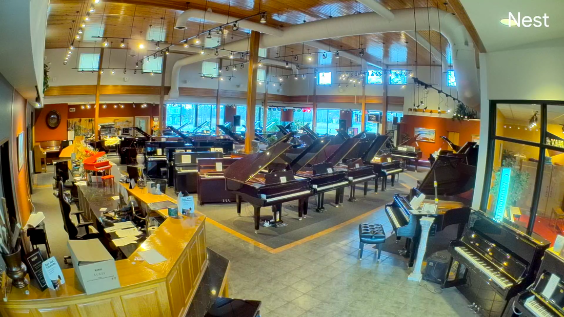 Hartland Piano showroom filled with grand and upright pianos