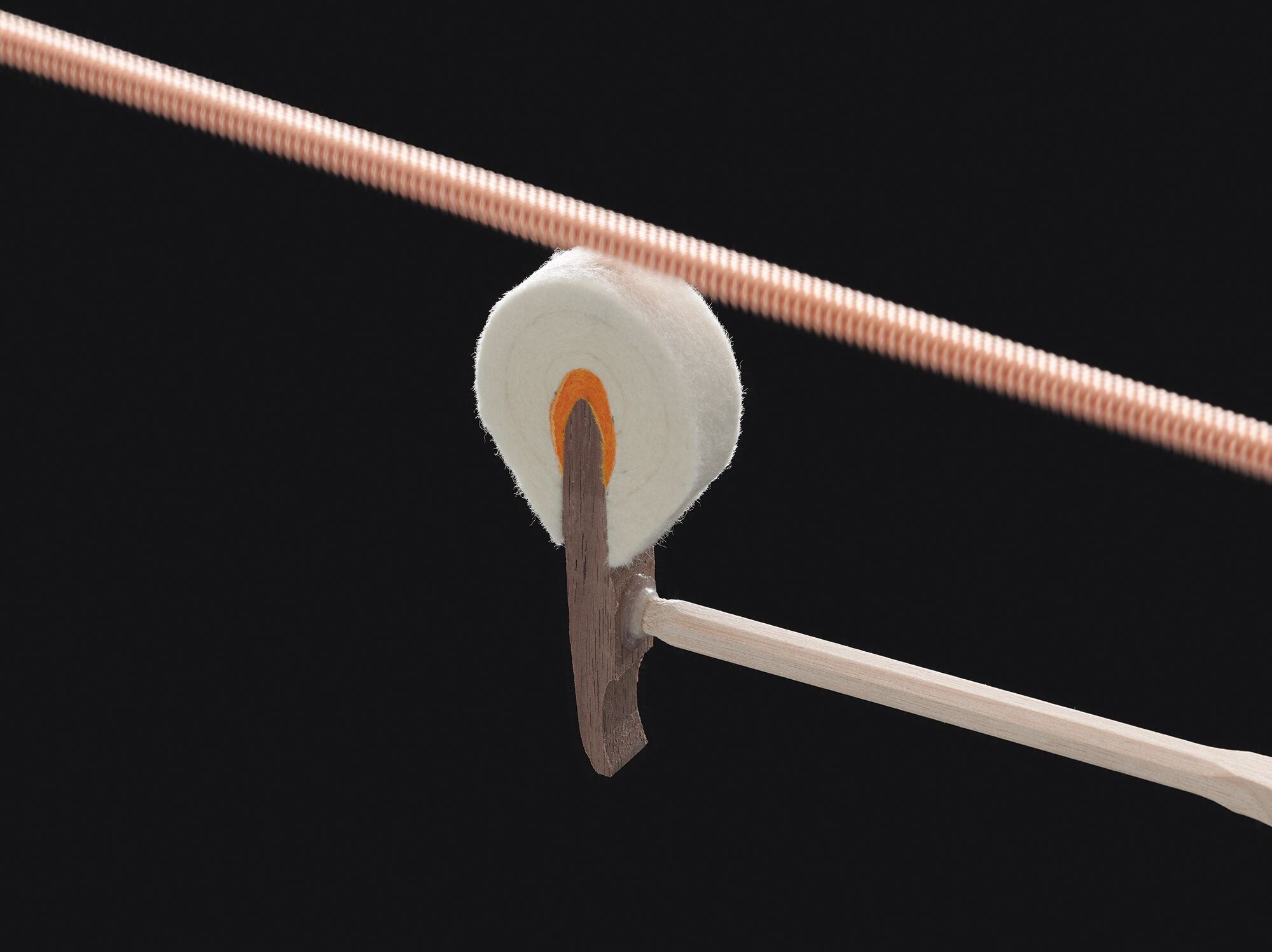 Felt-covered piano hammer and copper-wound string