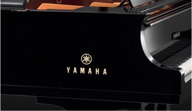 Yamaha logo detail on the polished CFX cabinet