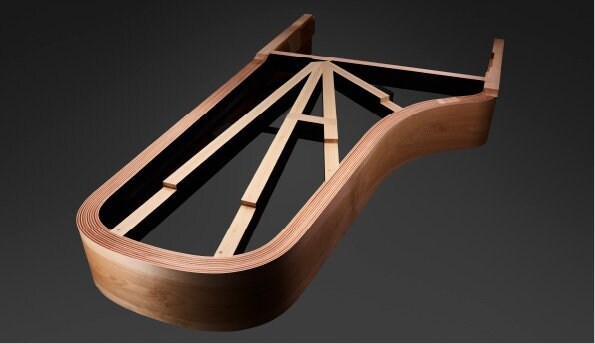 Hand-shaped wooden rim and back posts of the Yamaha CFX