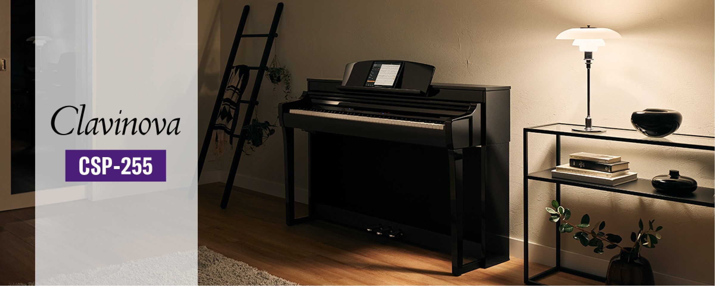 A polished ebony Yamaha CSP-255 Clavinova digital piano in a warmly lit living room