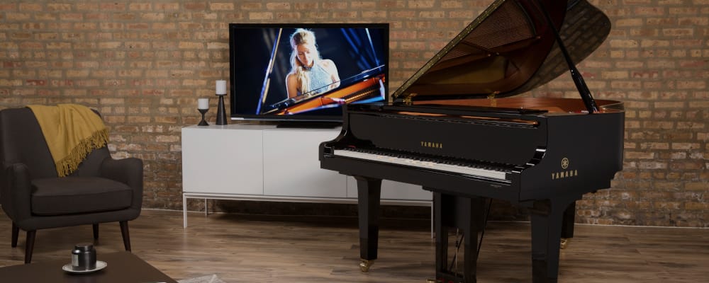 Yamaha Disklavier piano in a contemporary living room.