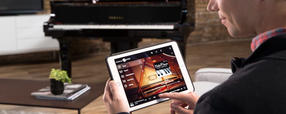User accessing the Disklavier control app on an iPad.