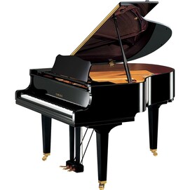 Yamaha GC1 grand piano with its lid open on a white background.