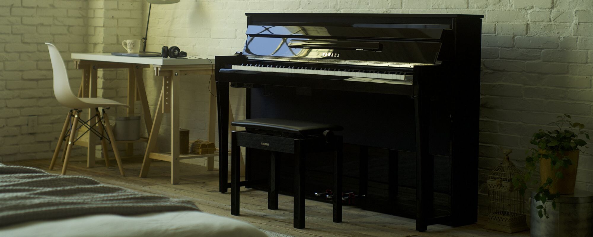 Yamaha NU1XA AvantGrand hybrid piano in a modern room.