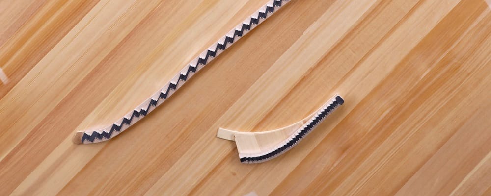 Close-up of ribs and crown elements in a piano that is in process of being built.