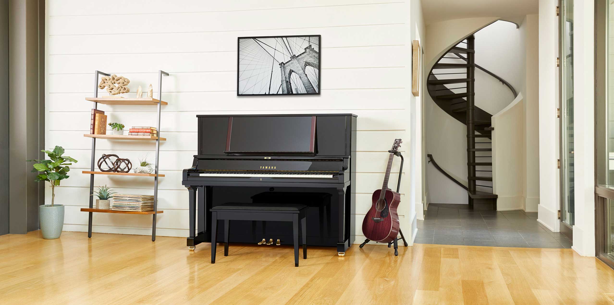 Yamaha YUS Series upright piano in a bright home setting.